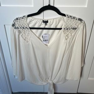 Blouse with shoulder detail tied front